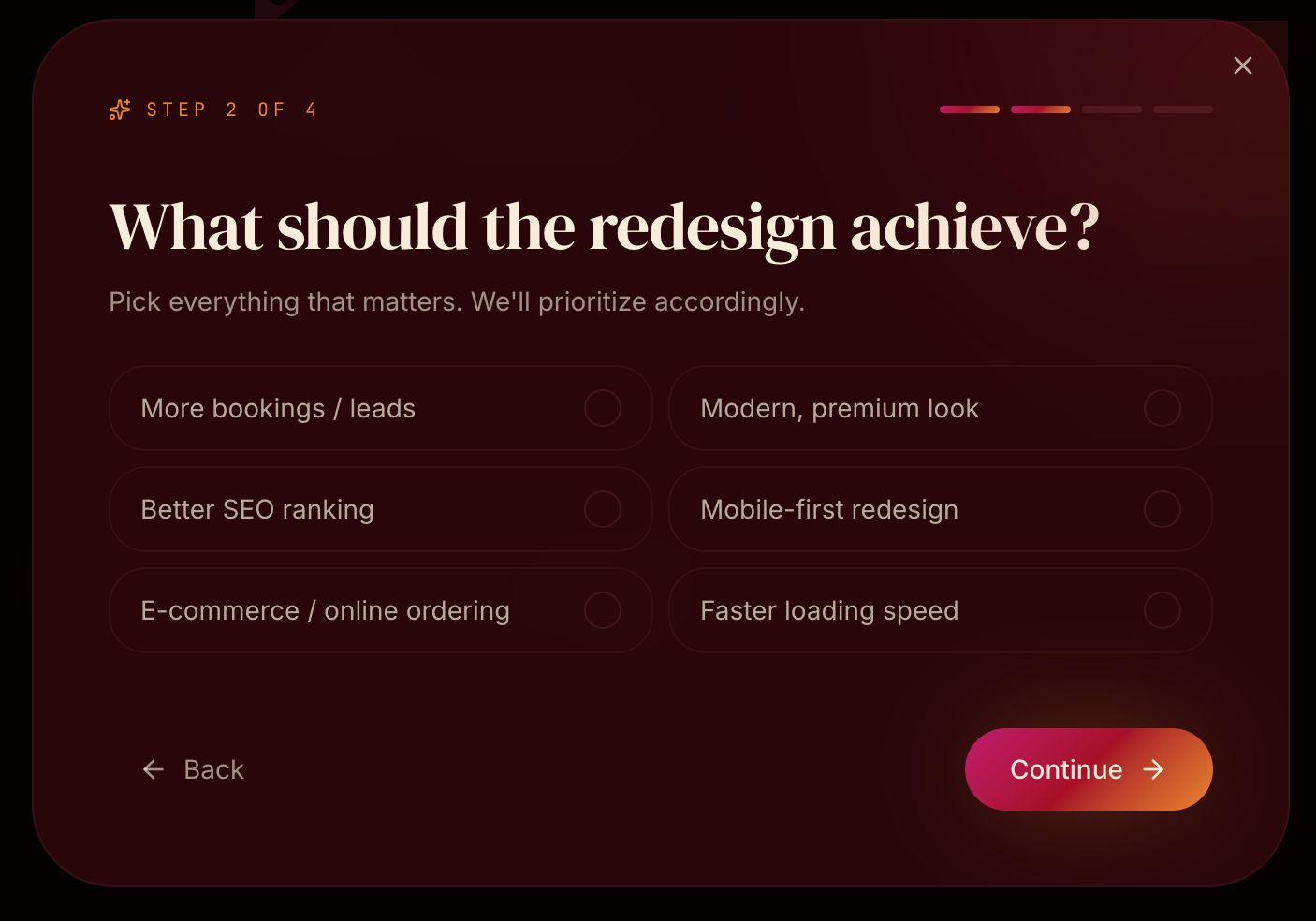 Step two of the Papaya Studio intake flow asking what the redesign should achieve
